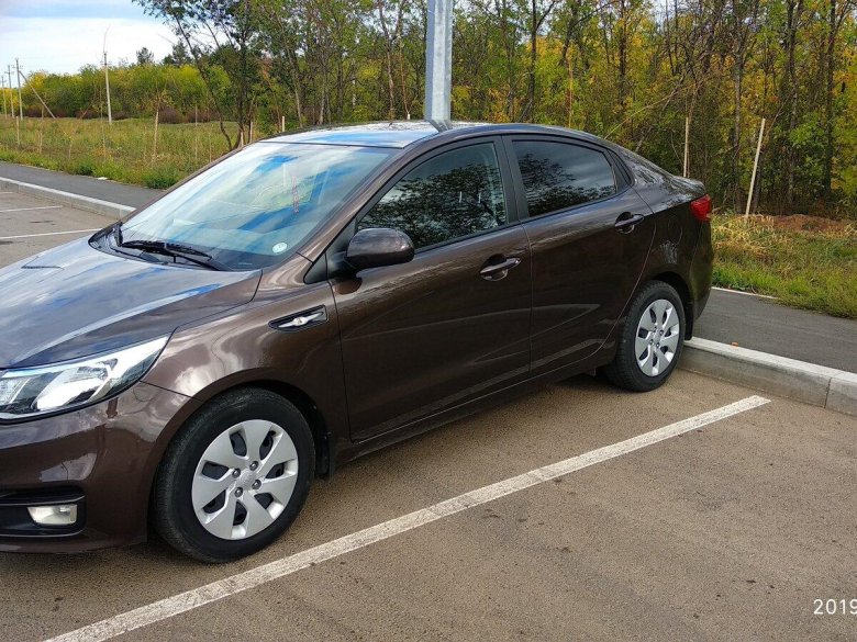 Киа Рио 3 седан коричневый