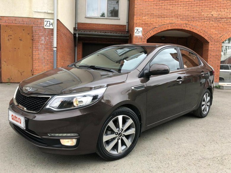 Kia Rio 2015 коричневый хэтчбек