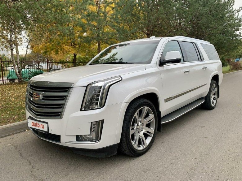 Белый кадиллак эскалейд