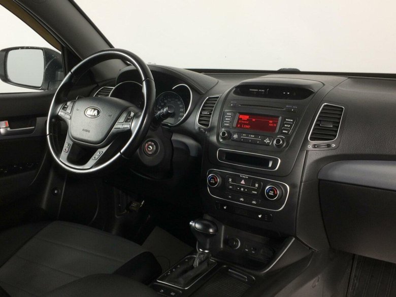 Киа Соренто 2013 год салон