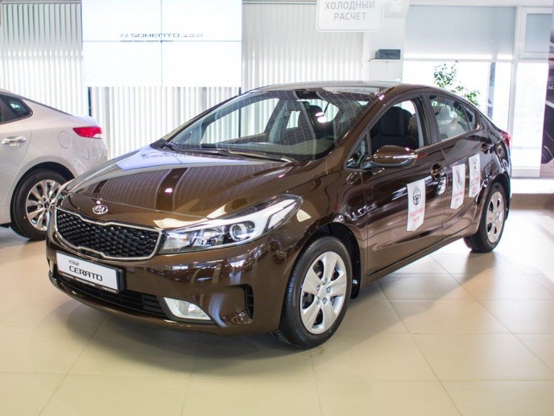 Kia Cerato коричневый